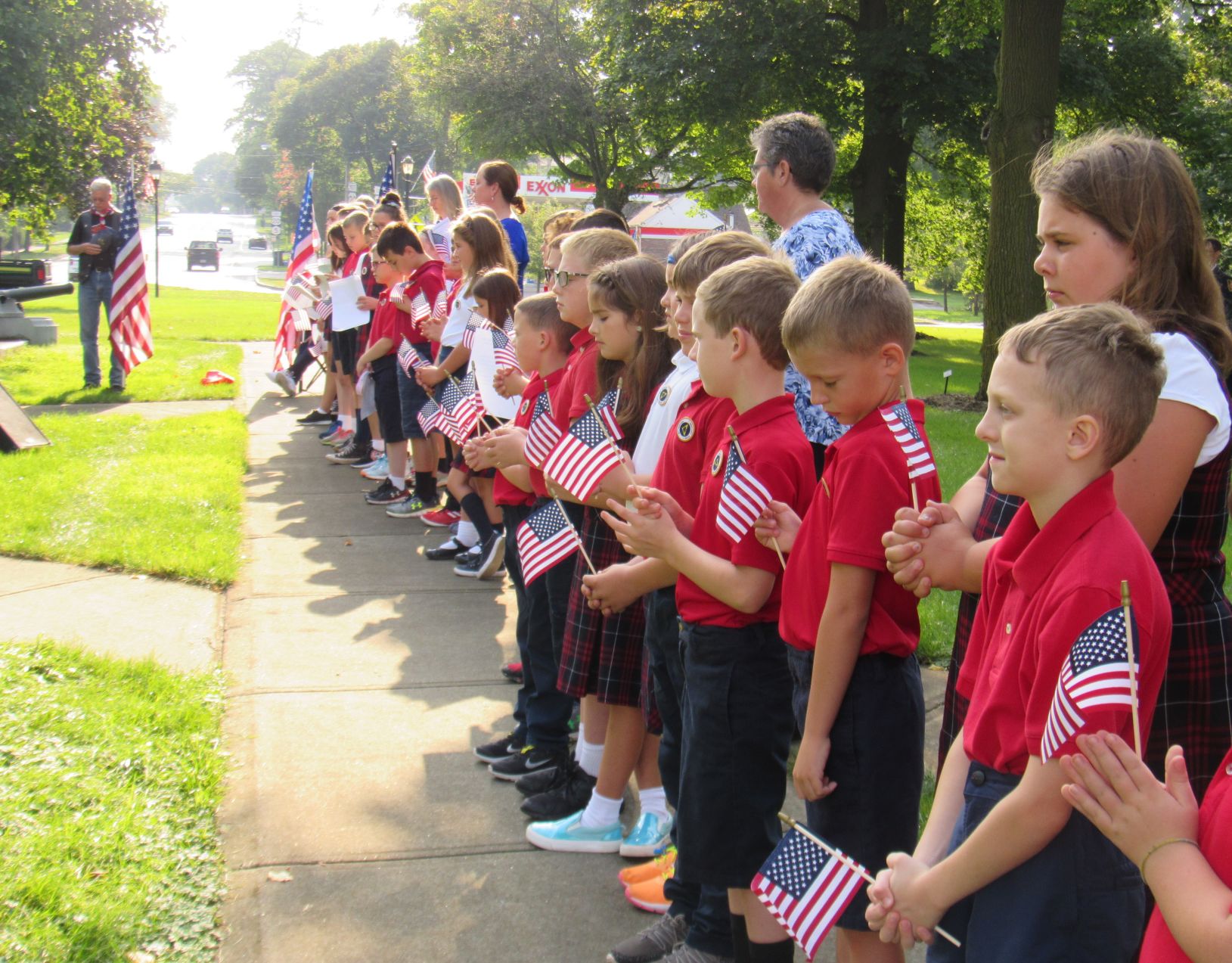 Students say a prayer.